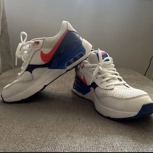 Nike White Sneakers with Red and Blue Accents